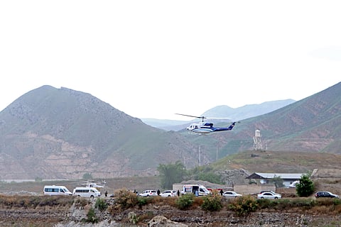 In this photo provided by Islamic Republic News Agency, IRNA, the helicopter carrying Iranian President Ebrahim Raisi takes off at the Iranian border with Azerbaijan on Sunday, May 19, 2024.