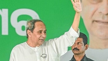 CM Naveen waving at supporters ahead of the public meeting in Deogarh