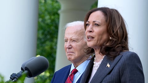 US Vice President Kamala Harris speaks as President Joe Biden listens in the Rose Garden of the White House in Washington, Monday, May 13, 2024, during a reception celebrating Asian American, Native Hawaiian, and Pacific Islander Heritage Month.