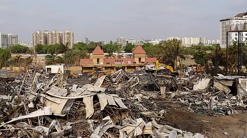 Debris being removed from the game zone site where a major fire on Saturday evening killed at least 27 people and injured three, in Rajkot.