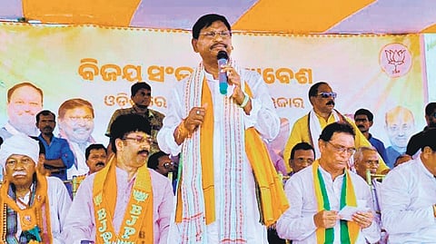 Union Minister Arjun Munda addressing a campaign rally in Morada 
