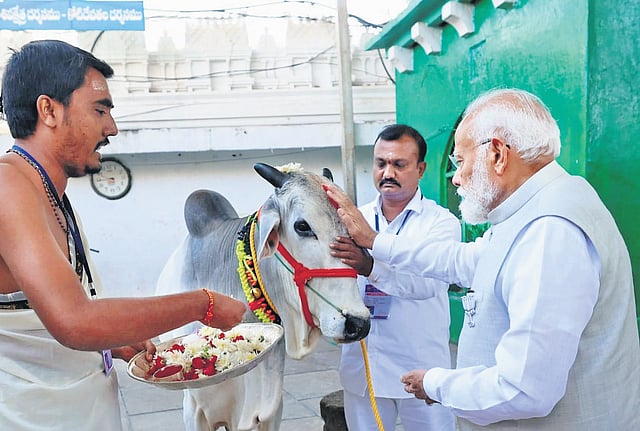 Prime Minister Narendra Modi performs special puja at the Sri Raja Rajeshwara Swamy temple in Vemulawada on Wednesday