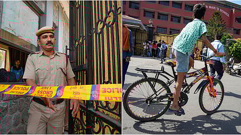 A police personnel exits the Mother Mary's School, Mayur Vihar after multiple schools received bomb threats via e-mail, in New Delhi.