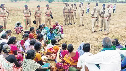Villagers protestING against land survey works near Panangudi on Saturday