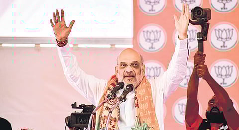 Home Minister Amit Shah addresses a public meeting in support of party candidate Ajay Mishra in Lakhimpur Kheri on Wednesday.