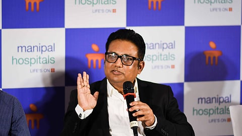 Partha Das, Chief People Officer of Manipal Hospitals speaks to media at a press conference in Bhubaneswar on Wednesday.