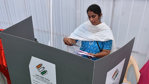 Government employees who were engaged on election duty cast their vote during the postal ballot drive at IGMC stadium in Vijayawada on Saturday. 