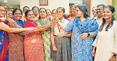 Medha P Shetty who secured the 2nd rank celebrates with her teachers at Holy Child High School on Thursday