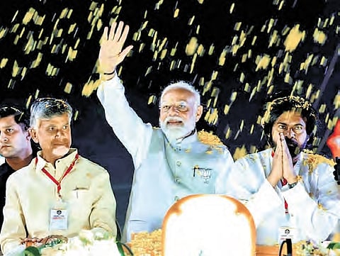 Prime Minister Narendra Modi, TDP supremo N Chandrababu Naidu and JSP chief Pawan Kalyan during a roadshow in Vijayawada on Wednesday 