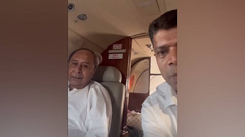 Chief Minister Naveen Patnaik with BJD leader VK Pandian in the aircraft that was diverted due to inclement weather.  