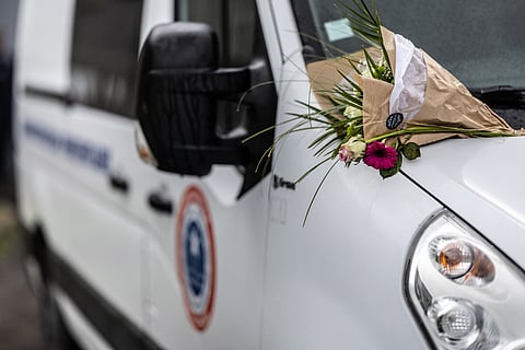 Flowers are displayed on a car of the penitentiary administration at the entrance of the jail in Brest, western France.