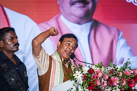 Union Minister and senior BJP leader Amit Shah with Jharkhand BJP President Babulal Marandi and other leaders releases the party's Sankalp Patra (election manifesto) for the upcoming Assembly elections, in Ranchi.