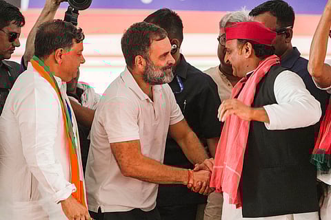 Congress leader Rahul Gandhi with Samajwadi Party (SP) chief Akhilesh Yadav and Congress candidate from Kanpur constituency Alok Misra during an election rally for the Lok Sabha polls, in Kanpur.