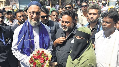 AIMIM chief Asaduddin Owaisi during his door-to-door election campaign at Karwan Assembly segment on Wednesday