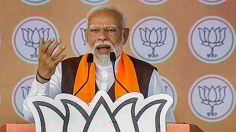 Prime Minister Narendra Modi addresses a public meeting for Lok Sabha polls, in Banaskantha, Gujarat, Wednesday, May 1, 2024.