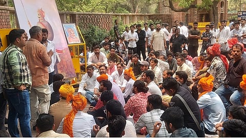 A group of university students staged a sit-in protest in front of the arts faculty for a brief period on Tuesday.