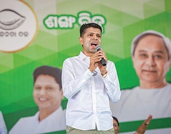 BJD leader VK Pandian addressing an election meeting at Brajarajnagar