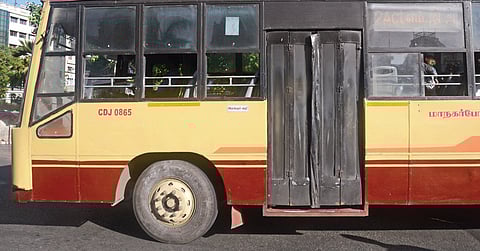 An MTC bus with the recently fixed automated door in the city