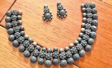 Indian terracotta has a long history in roof tiles, decorative items, and even building houses. 