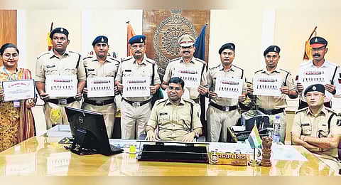 Raipur senior superintendent of police Santosh Singh with his subordinates