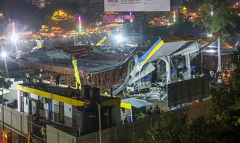 A damaged petrol pump after a huge iron hoarding collapsed on it due to strong winds and heavy rain, at Ghatkopar in Mumbai.