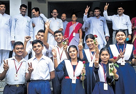 Teachers & students of Saraswati Sishu Mandir, Unit VII, celebrate the results 