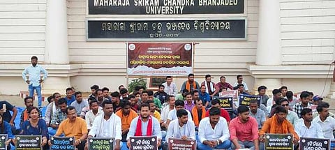 Curious as it may appear, the registrar of a state public university has been holding office and drawing salary despite completion of his tenure nearly a year ago.