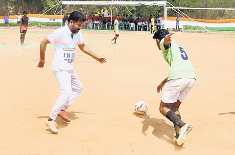 Chief Minister A Revanth Reddy plays a football match at the University of Hyderabad