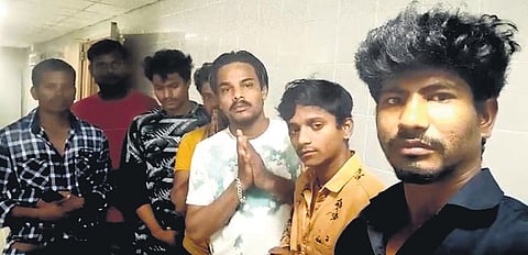 Video grab of the seven workers stranded in Muscat.