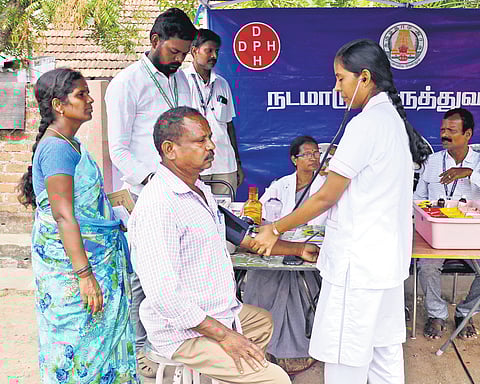 BJP cadre staged a protest condemning the government during which they carried a ‘corpse,’ in Coimbatore on Saturday 
