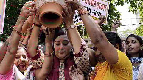 New Delhi: BJP MP Bansuri Swaraj with other leaders demonstrates against the Delhi Jal Board over the ongoing water crisis, in New Delhi.