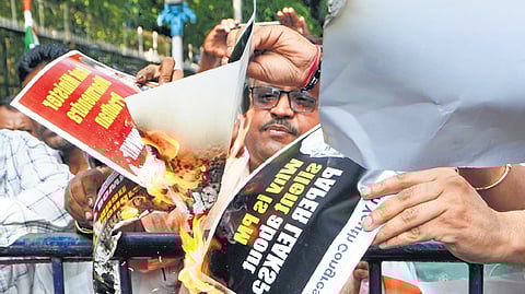 Activists protest over the alleged irregularities in NEET-UG results.