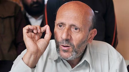 Baramulla MP Sheikh Abdul Rashid, popularly known as Engineer Rashid, interacts with the media after walking out of Tihar Jail, in New Delhi.