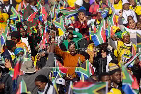 South Africans gather ahead of the inauguration of South Africa's Cyril Ramaphosa as President at the Union Buildings South Lawns in Pretoria, South Africa, on June 19, 2024.
