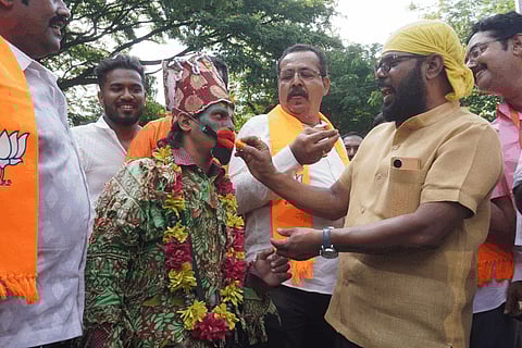 (L) PM Narendra Modi holds a roadshow in T Nagar, Chennai; (R) Tamil Nadu CM MK Stalin and Congress leader Rahul Gandhi pose at the INDIA bloc rally in Coimbatore.