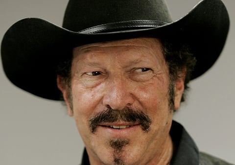 In this Nov 7, 2009 file photo, Independent, gubernatorial candidate Kinky Friedman talks with the media at his campaign headquarters in Austin, Texas.