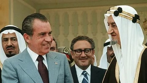 US President Richard Nixon (L) and US Secretary of State Henry Kissinger (C) with Saudi King Faisal at the Riasa Palace in Riyadh, July 15, 1974.