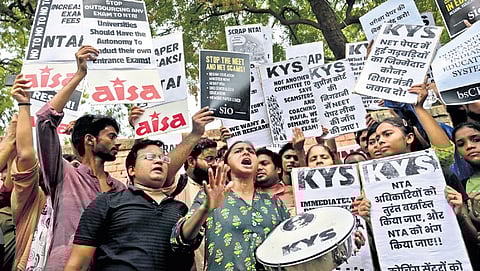 Members of various organisations protest against the National Testing Agency (NTA) over the alleged irregularities in NEET results at Jantar Mantar.