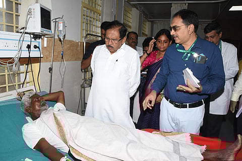 Karnataka Home Minister Dr G Parameshwara visiting the victims at the district general hospital in Tumakuru on Thursday.