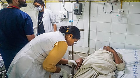A patient admitted due to heat stroke and exhaustion undergoes treatment at Delhi hospital last year.