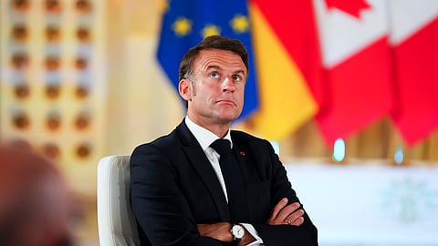 French President Emmanuel Macron takes part in a working session during the G7 Summit in Borgo Egnazia, southern Italy, Thursday, June 13, 2024.