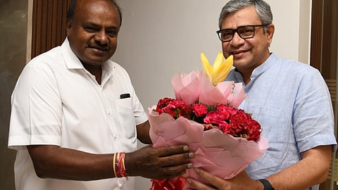 Union Minister of Steel and Heavy Industries HD Kumaraswamy greets Railway Minister Ashwini Vaishnaw in New Delhi on Wednesday.