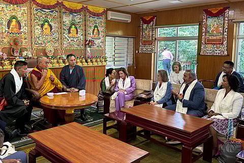 This handout photograph shared by Leslie Shedd, a member of the communication team of United States House of Representatives Committee on Foreign Affairs shows United States congressional delegation led by Republican Rep. Michael McCaul meeting with Tibetan spiritual leader the Dalai Lama, second left, in Dharamshala, India, Wednesday, June 19, 2024.