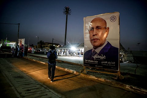 An electoral banner for Mauritanian president Mohamed Ould Ghazouani is placed during a campaign rally