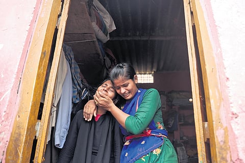 Relatives of one of the children who died in a wall collapse breaks down at Babul Reddy Nagar in Rangareddy district on Monday