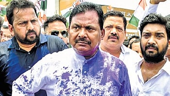 OPCC president Sarat Pattanayak covered in ink on Friday 