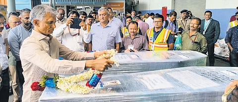 Revenue Minister Krishna Byre Gowda pays tribute to the mortal remains of the trekkers who lost their lives in Uttarkashi, in Bengaluru on Friday 