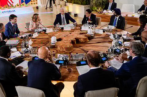 The summit opened Thursday with a strong show of support for Kyiv