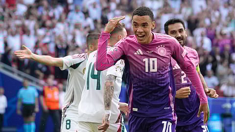 Germany's Jamal Musiala (10) celebrates after scoring during a Group A match between Germany and Hungary at the Euro 2024 soccer tournament in Stuttgart, Germany, Wednesday, June 19, 2024.