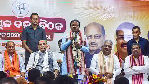 LA from Keonjhar Sadar Mohan Majhi, who has been elected as the Chief Minister of Odisha, speaks to fellow legislators at the party office in Bhubaneswar on Tuesday.